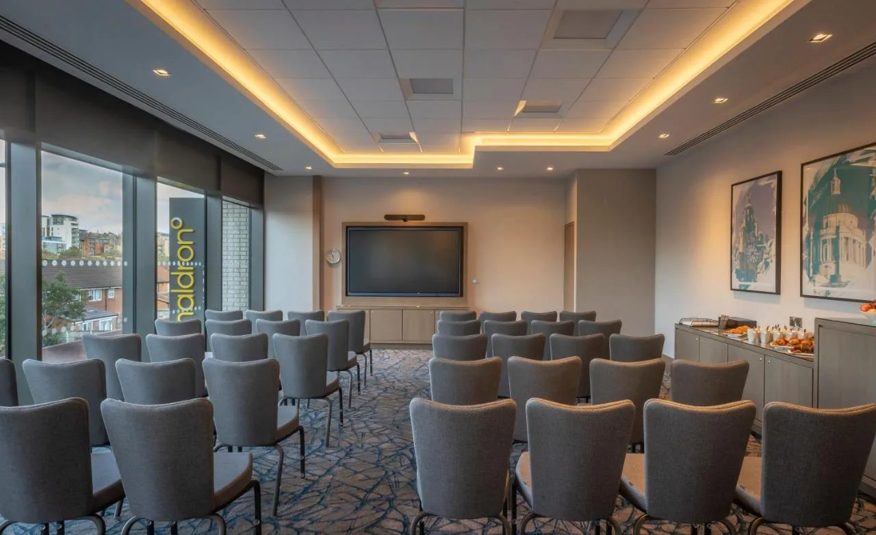 Conference room with projection screen at Maldron Hotel Liverpool City Centre