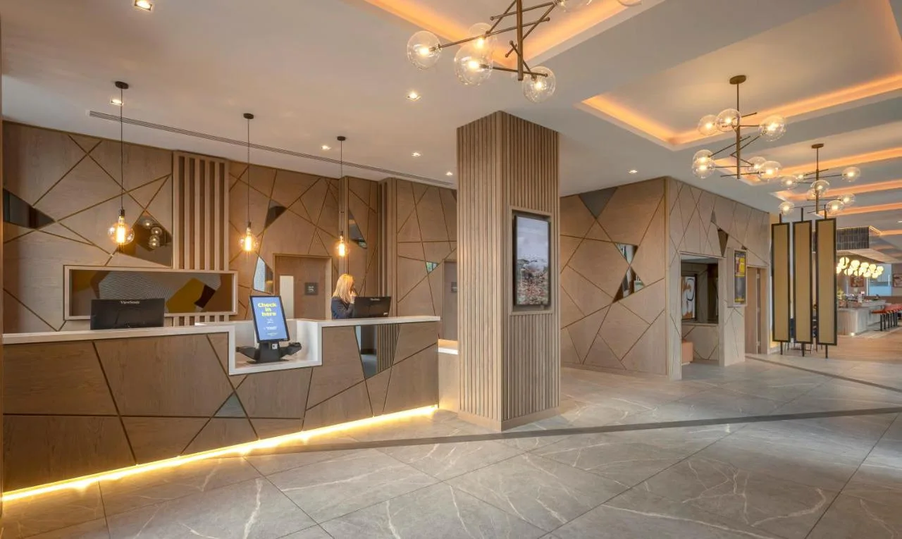 Lobby and reception desk at Maldron Hotel Liverpool City Centre